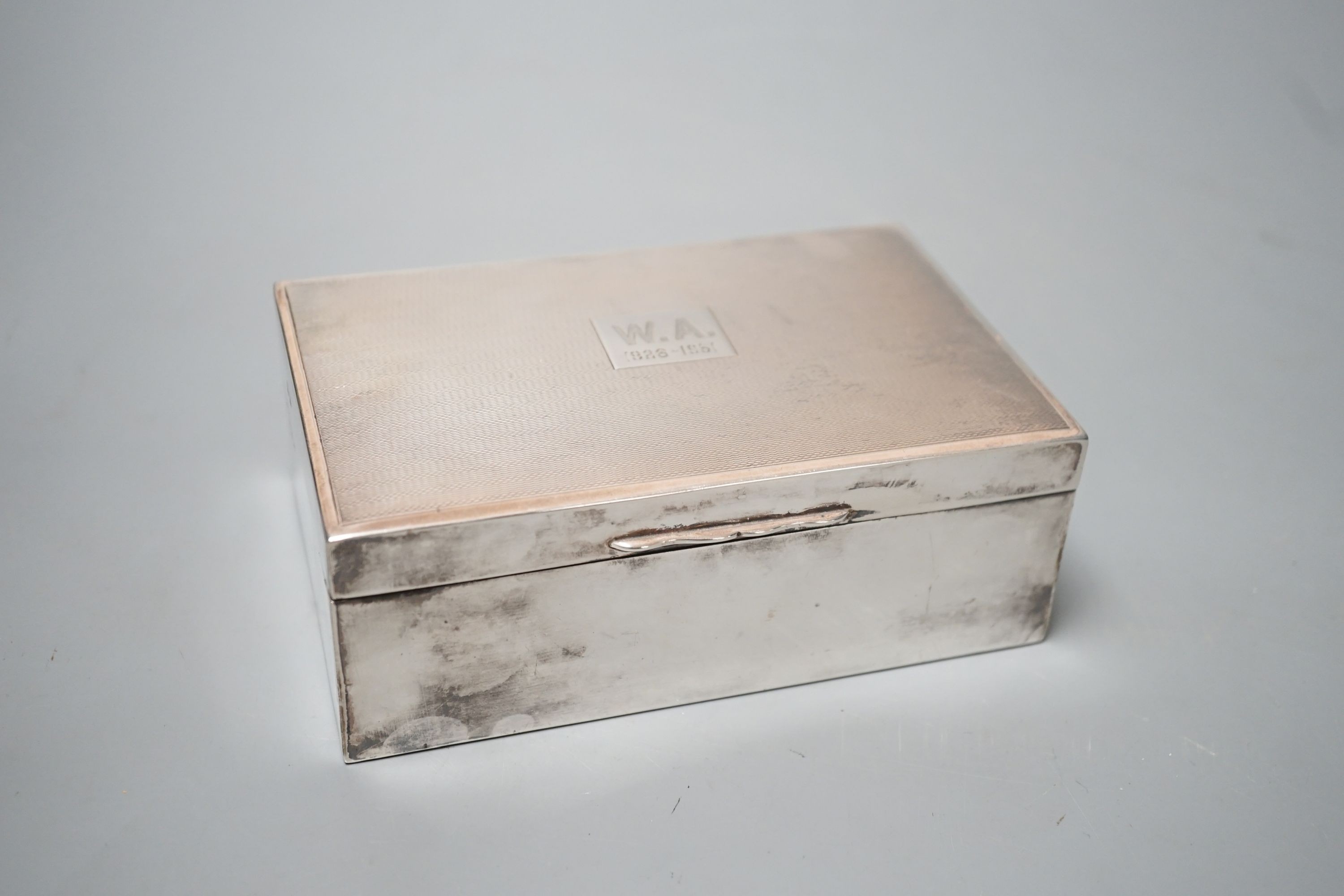 A 1950's part engine turned silver mounted cigarette box, 14.3cm, gross 14.5oz